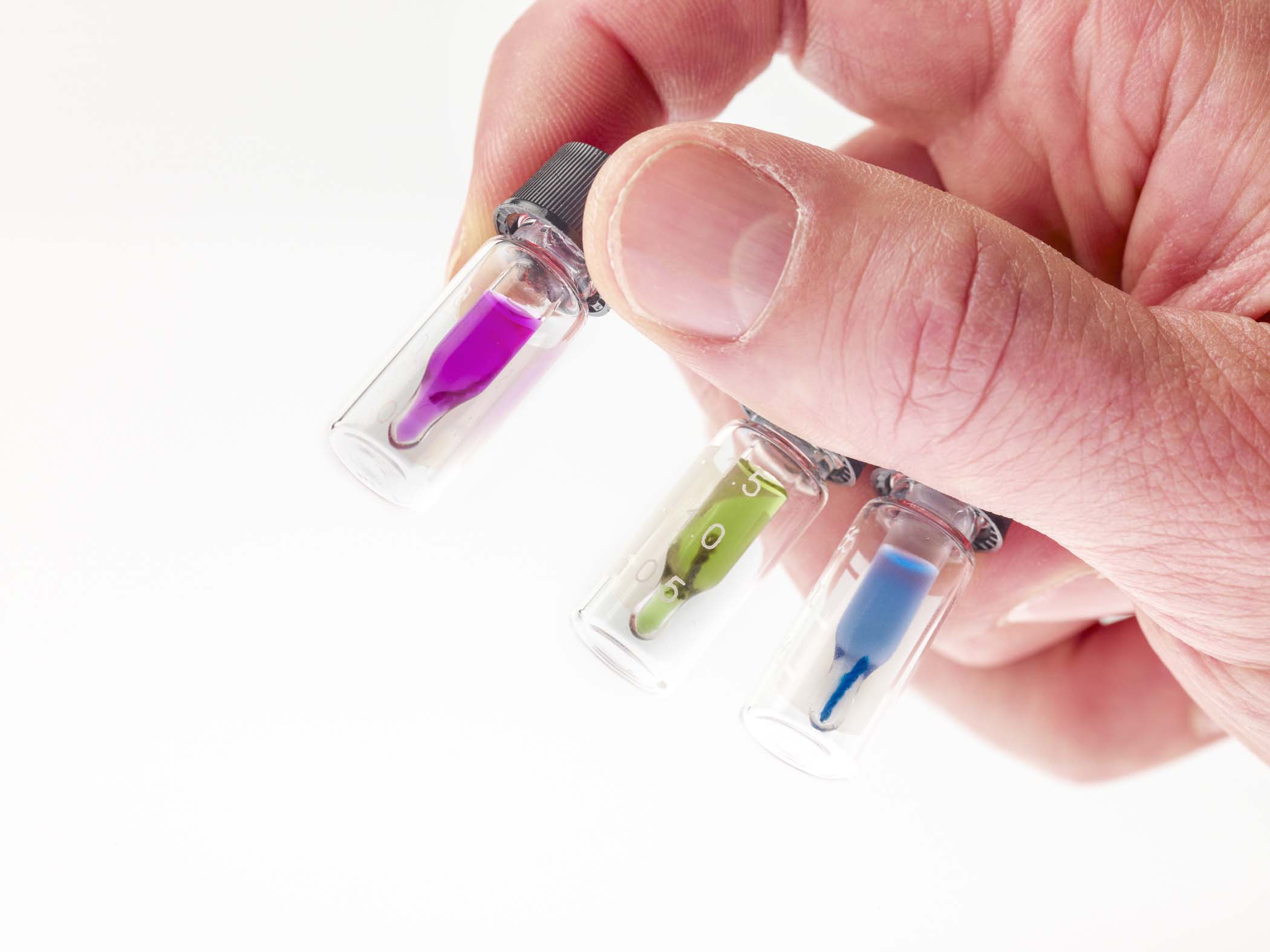 extraction vials in hand